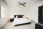 Master bedroom with king bed and flat screen HDTV